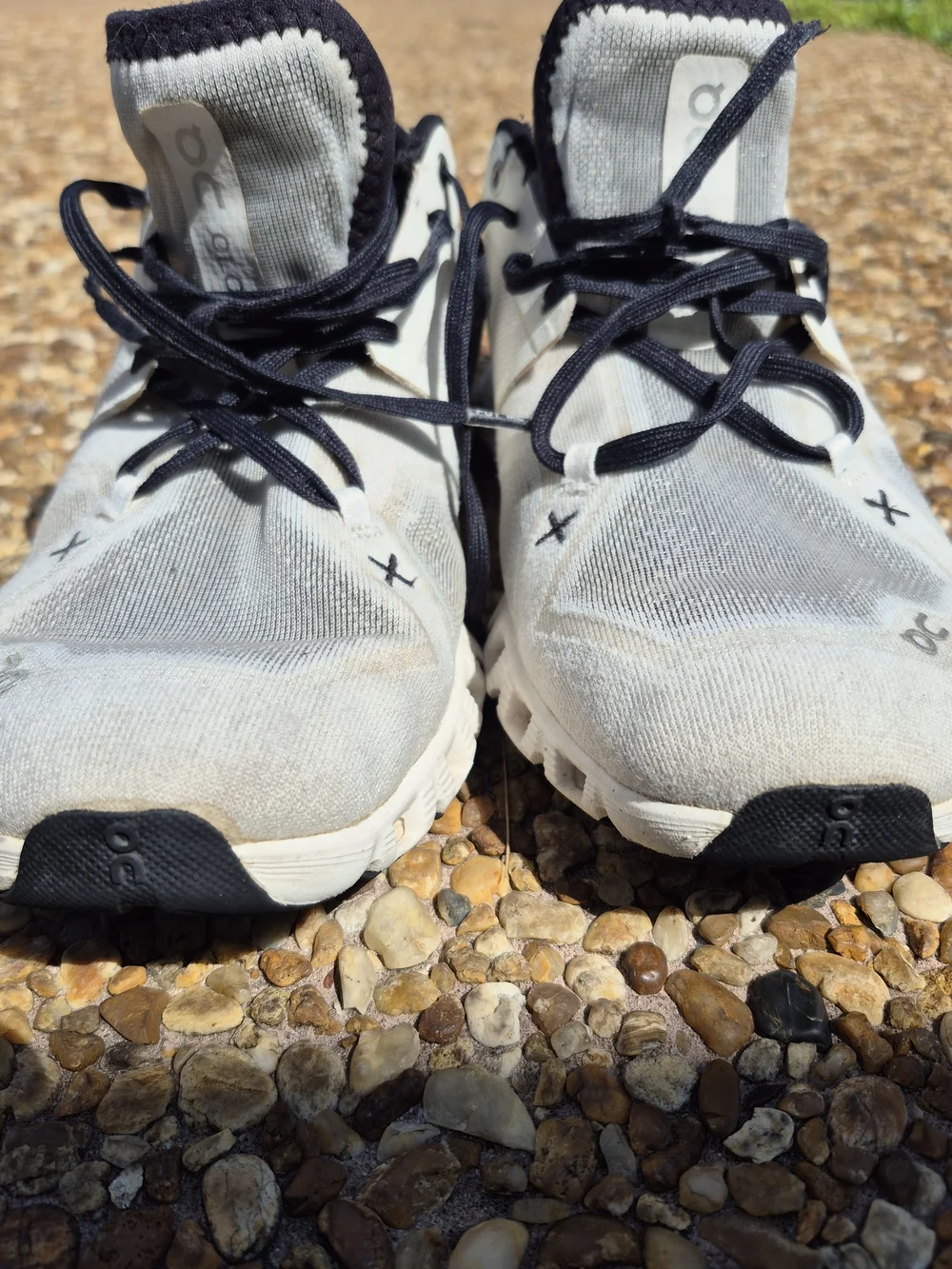 On Running Men’s Cloud Athletic Sneakers in White and Black